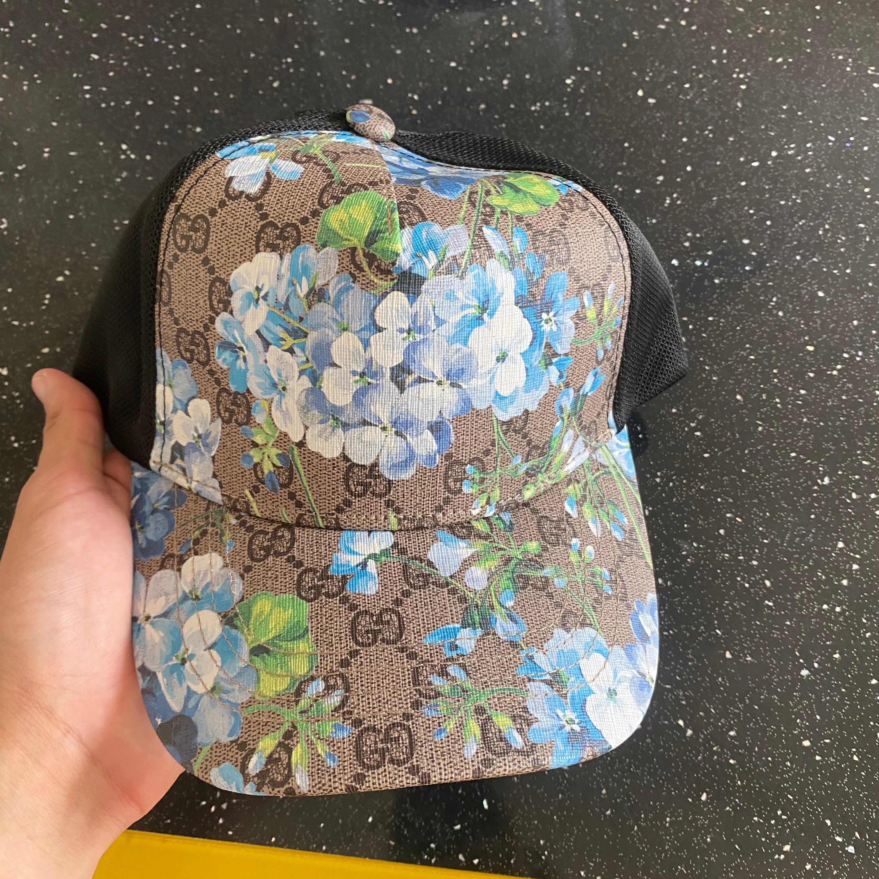 Beige Cap Blue Flower